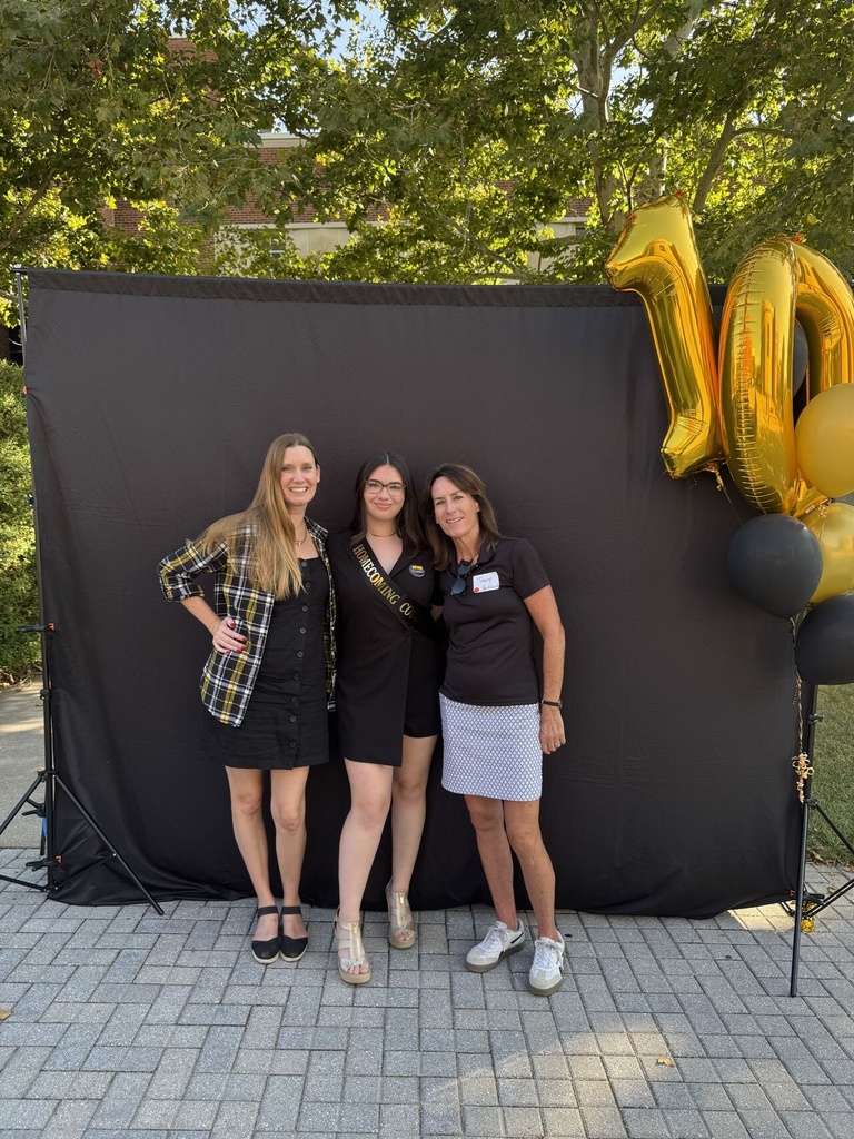 Heather, Tracy and Reanna posing for a homecoming pic