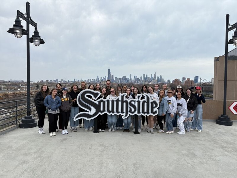 Group picture in from of White Sox Southside sign
