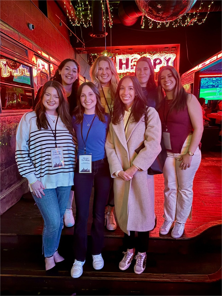 Group pic of 7 EVNT alumni at Happer Camper