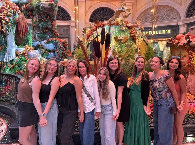 eight IMEX attendees posing for picture