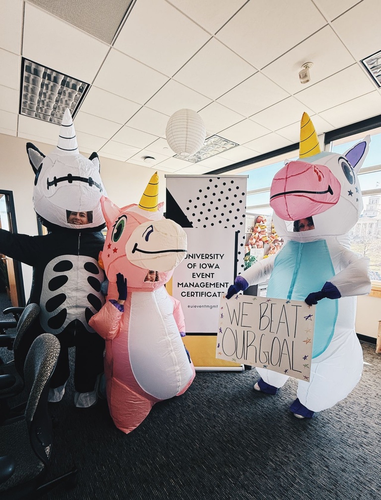 Heather, Susan, Tracy dressed as Unicorns in EVNT office