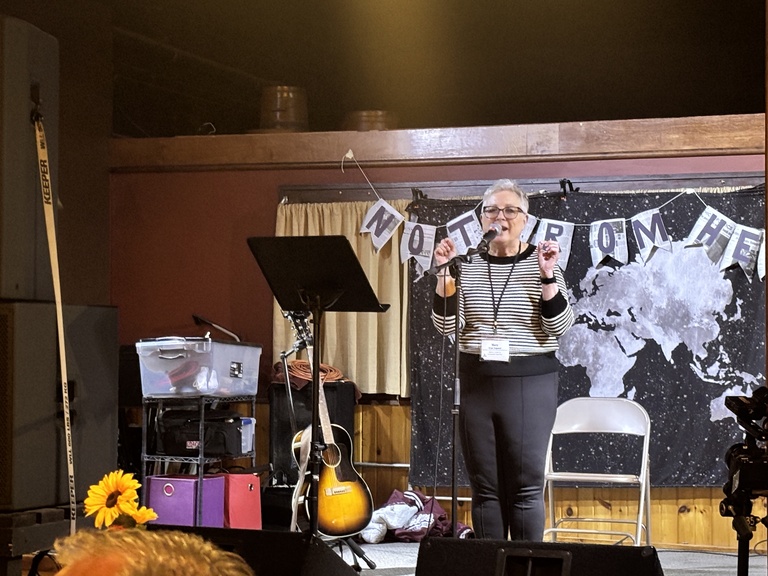 A woman speaking at an event