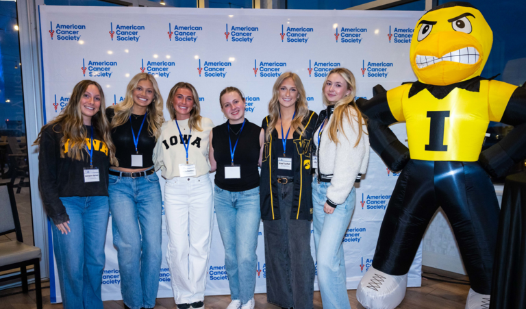 Student group posing for a photo at their event