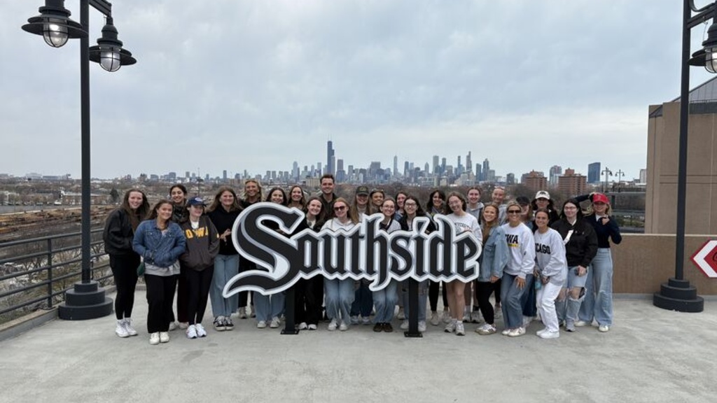 Group picture in from of White Sox Southside sign